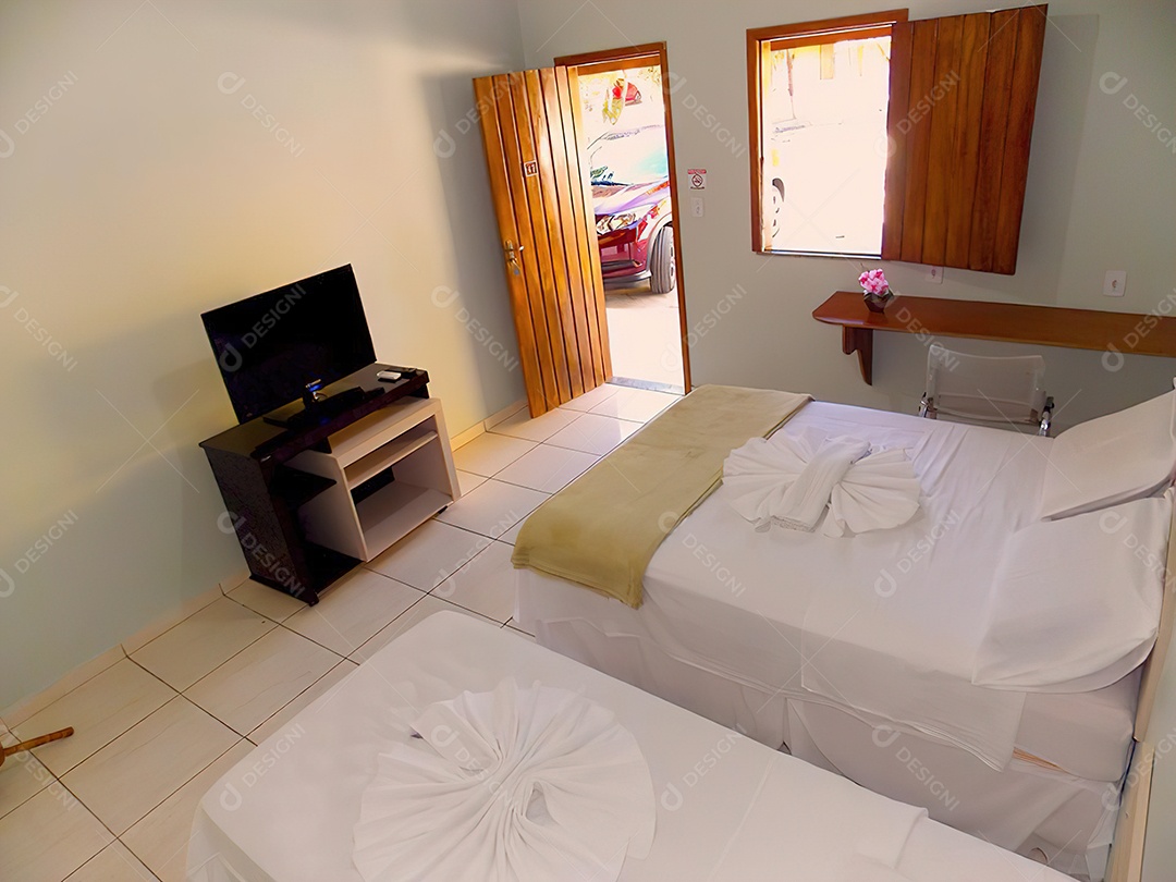 Quarto confortável em pousada