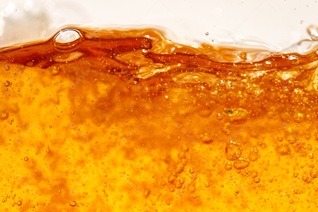 Close up brilhante laranja óleo ou textura de respingos de cerveja e ondas da natureza belas ondas curvas e pequenas bolhas suaves para design gráfico e fundo