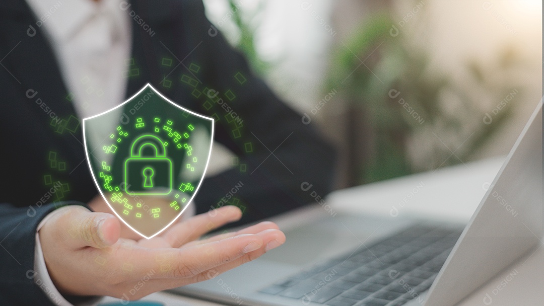 Mão de empresário mechendo em leptop com tecnologia avançada sobre fundo desfocado