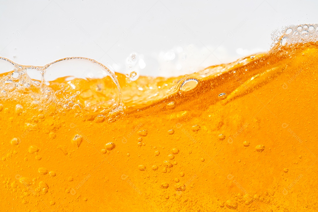 Close up brilhante laranja óleo ou textura de respingos de cerveja e ondas da natureza belas ondas curvas e pequenas bolhas suaves para design gráfico e fundo