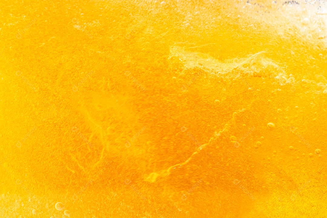 Close up brilhante laranja óleo ou textura de respingos de cerveja e ondas da natureza belas ondas curvas e pequenas bolhas suaves para design gráfico e fundo