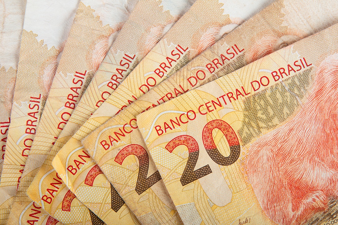 Dinheiro brasileiro close de um leque de notas de 20 reais