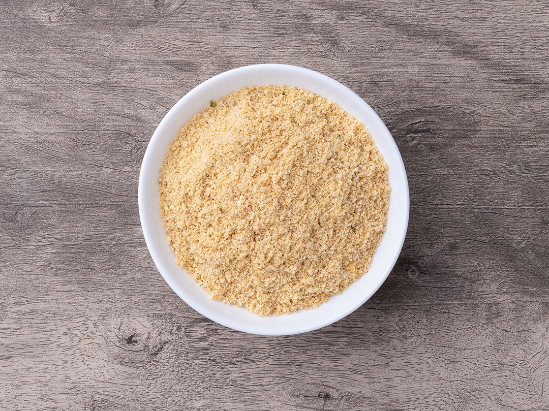 A imagem mostra uma tigela de farofa