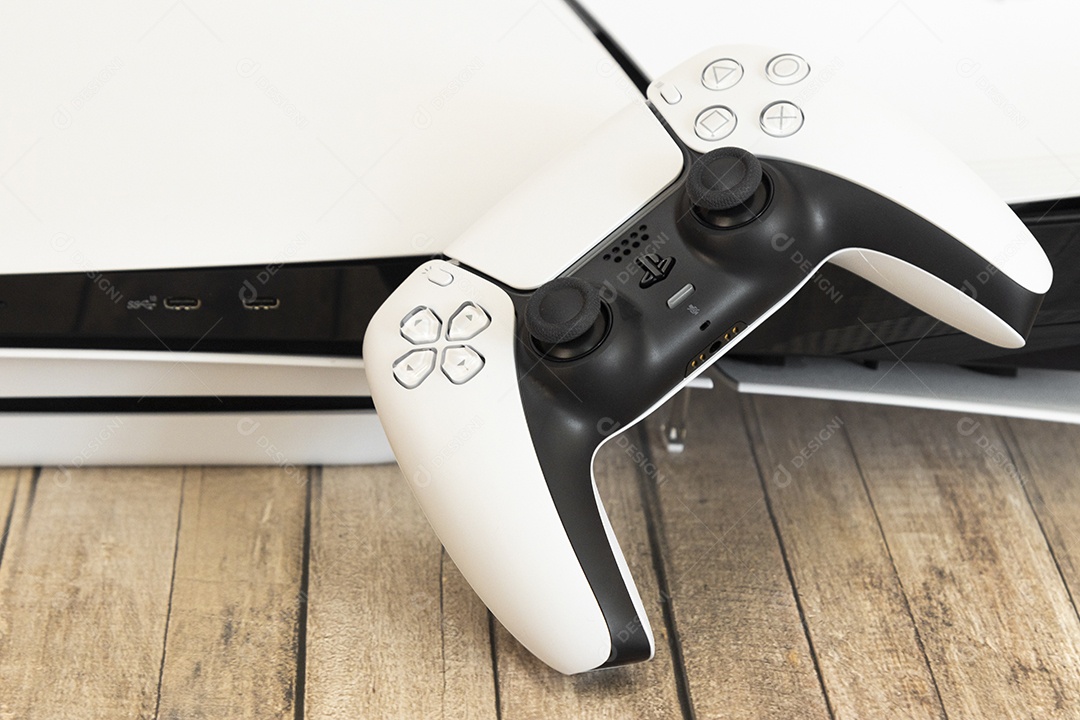 Vista superior de um controle remoto branco do Sony Playstation 5 sobre uma mesa branca