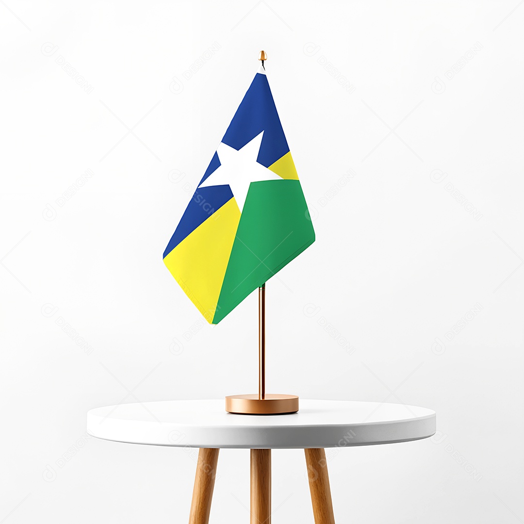 Mini bandeira do estado de Rondônia hasteada em cima de uma mesa