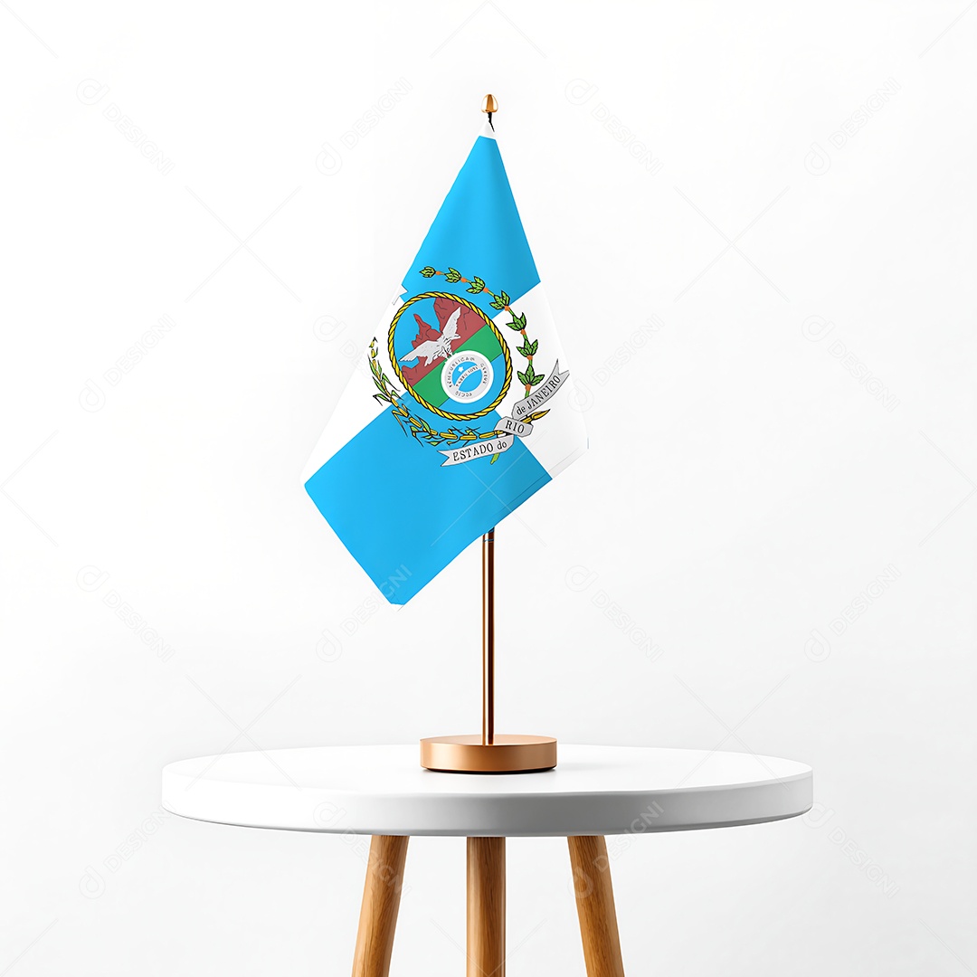 Mini bandeira do estado do Rio de Janeiro hasteada em cima de uma mesa