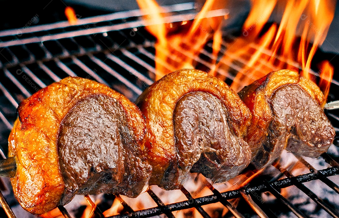 Espeto de picanha assando