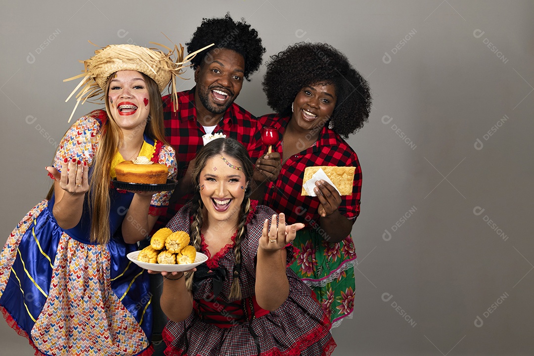 Grupo de jovens usando roupas típicas de festa junina sobre fundo isolado