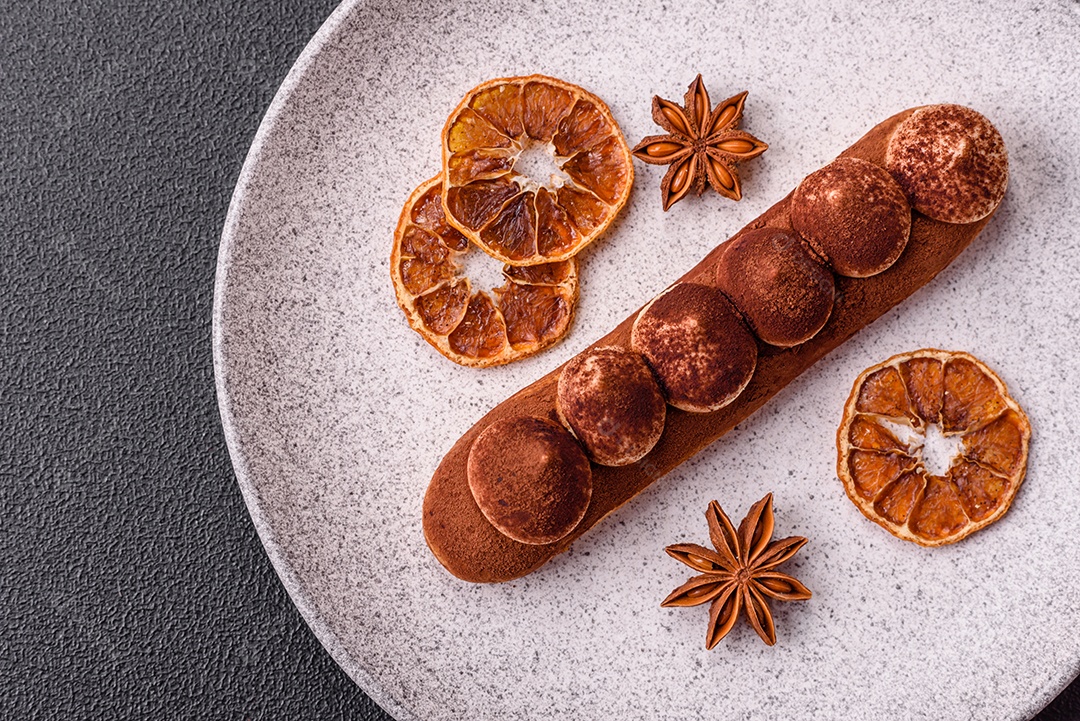 Retrato saboroso de éclair mesa concreto