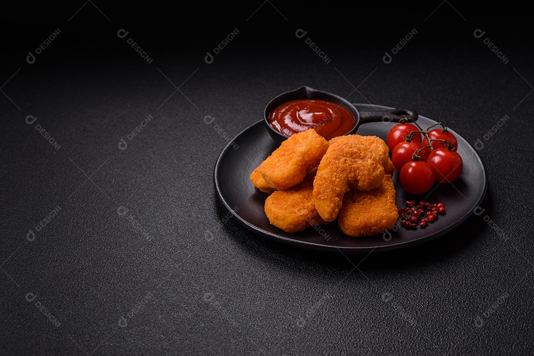 A imagem mostra nuggets de frango