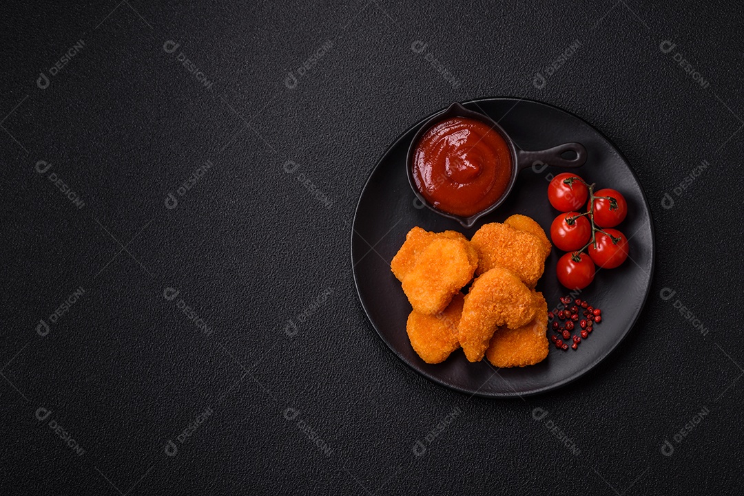 A imagem mostra nuggets de frango