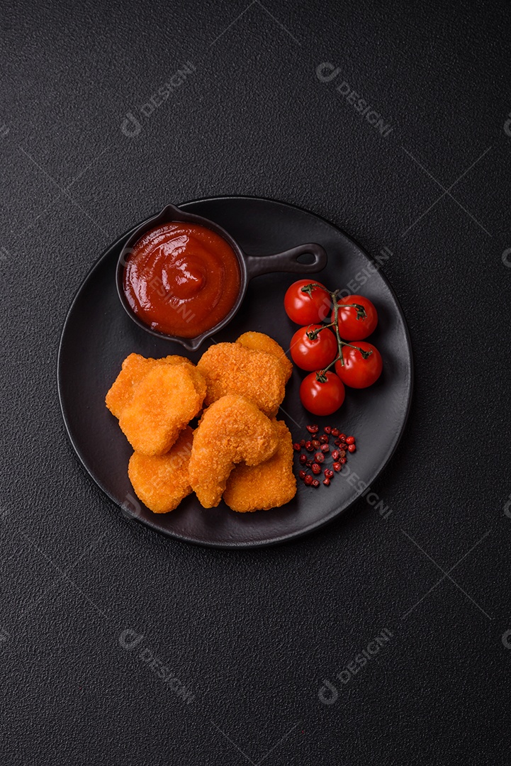 A imagem mostra nuggets de frango