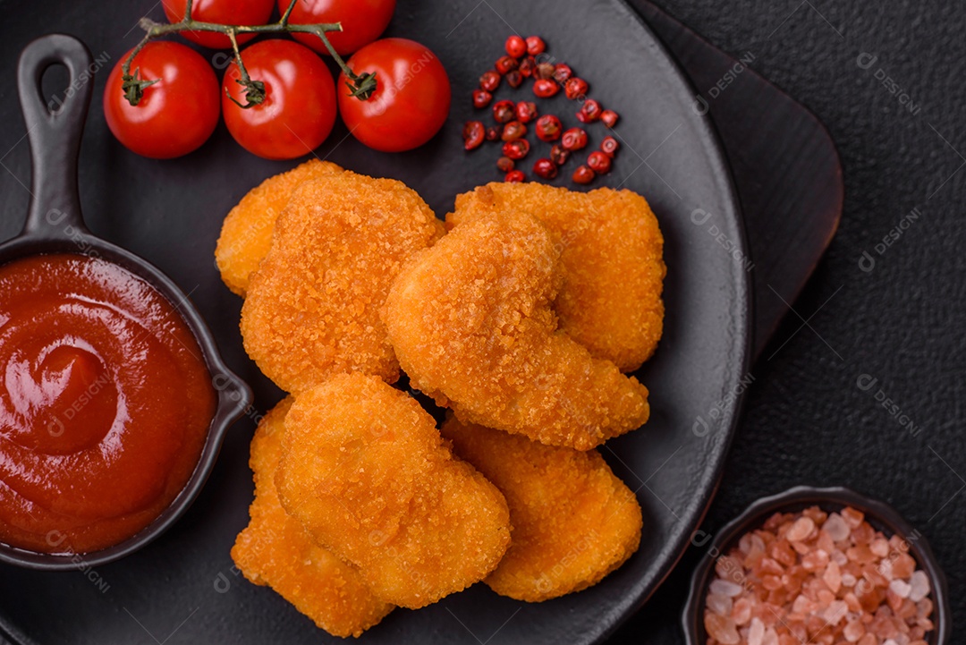 A imagem mostra nuggets de frango