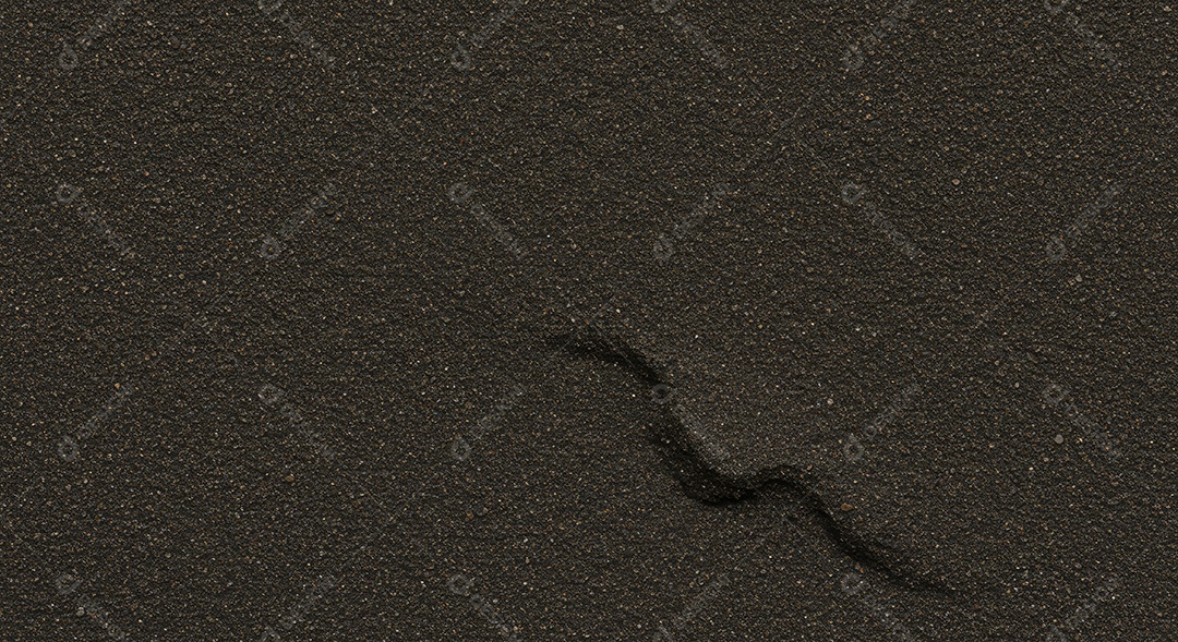 Textura de uma superfície de cor escura com uma rachadura no centro.